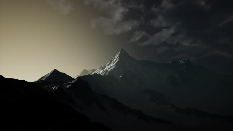 mountains in evening cloudy sky