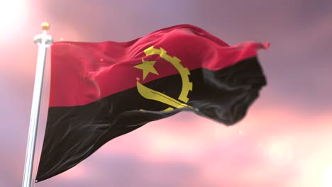 bandera de angola agitando el viento en lento al atardecer, bucle