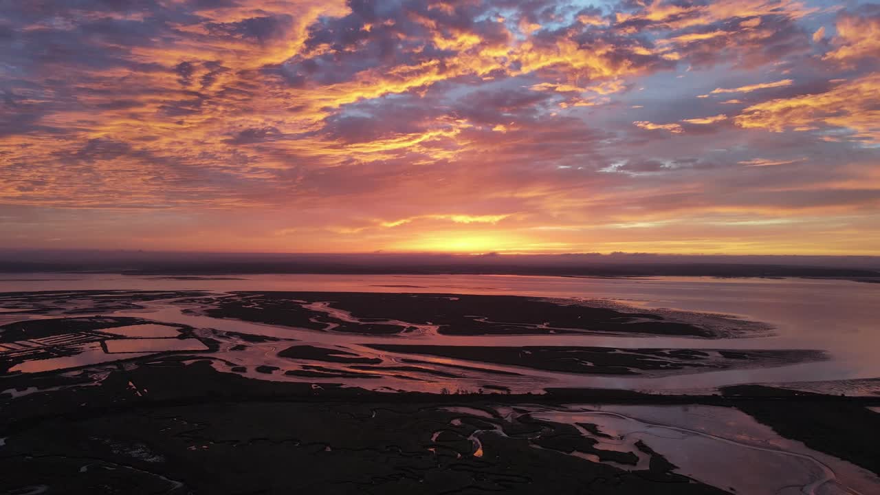 Sunrise with strong colours on the Sado river estuary