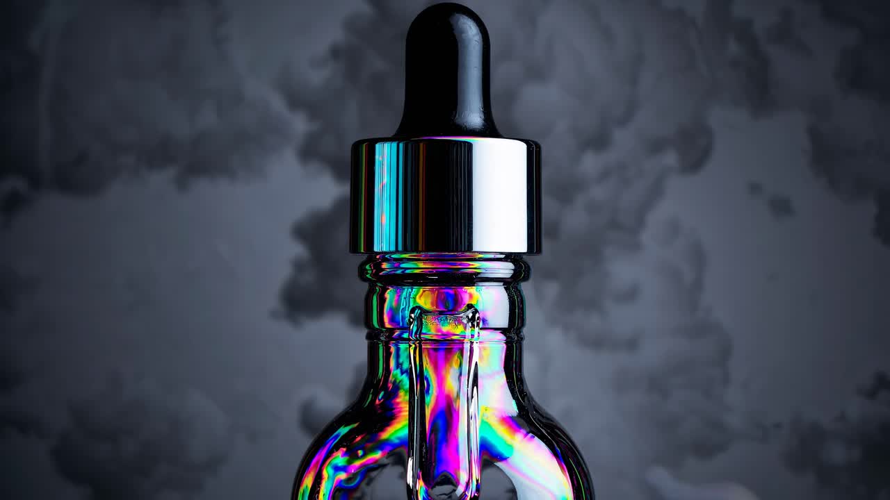 Close-up of an Iridescent Dropper Bottle
