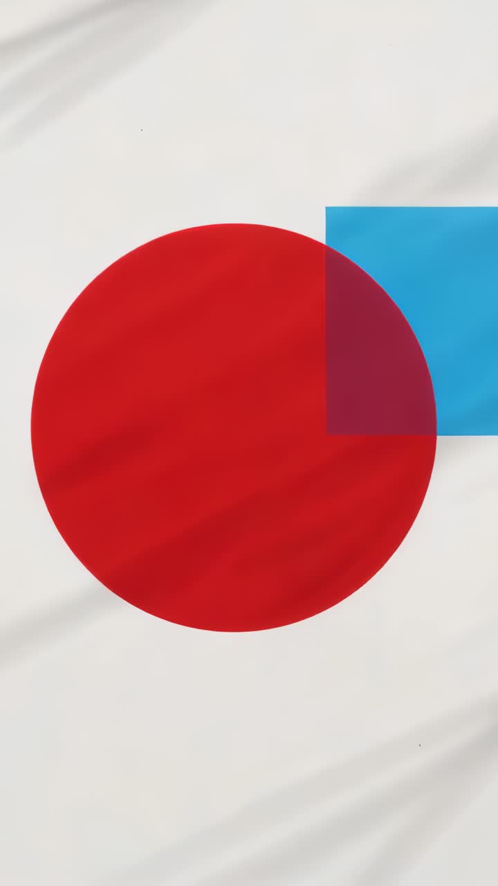 Vertical video: Appearing cyan planes orbiting red circle on white cloth, creating purple overlap