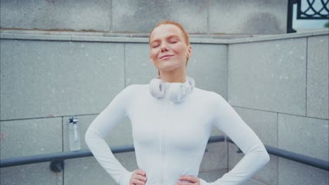 woman with headphones after workout