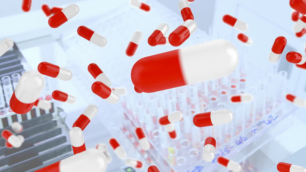 Animation of falling pills over test tubes