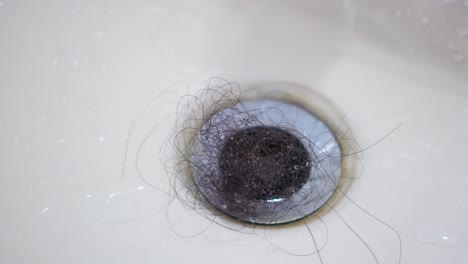 hair clog in bathroom sink drain