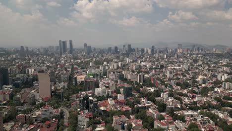 From-above,-exploring-high-demand-real-estate-in-Mexico-City,-Roma-condesa-neighborhood