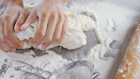 woman kneading a dough 4k