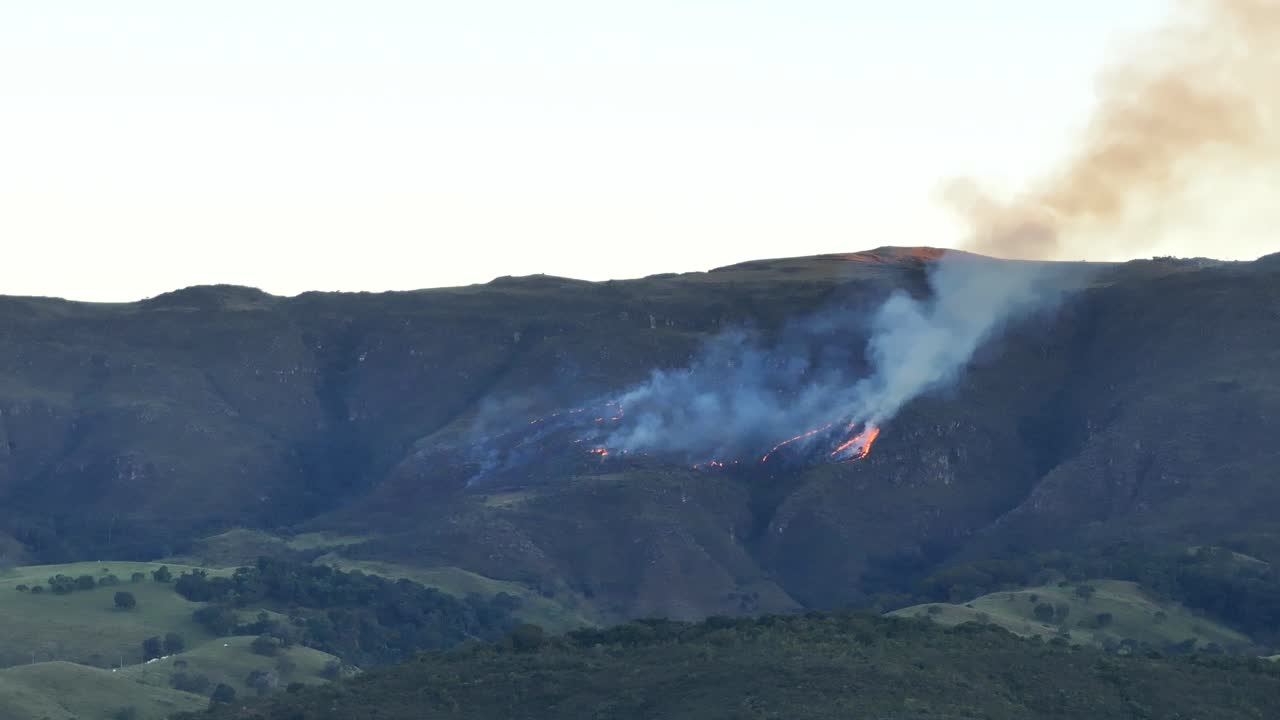 Drone view of fire caused by residents in native forest area of ​​the cerrado biome in a national park