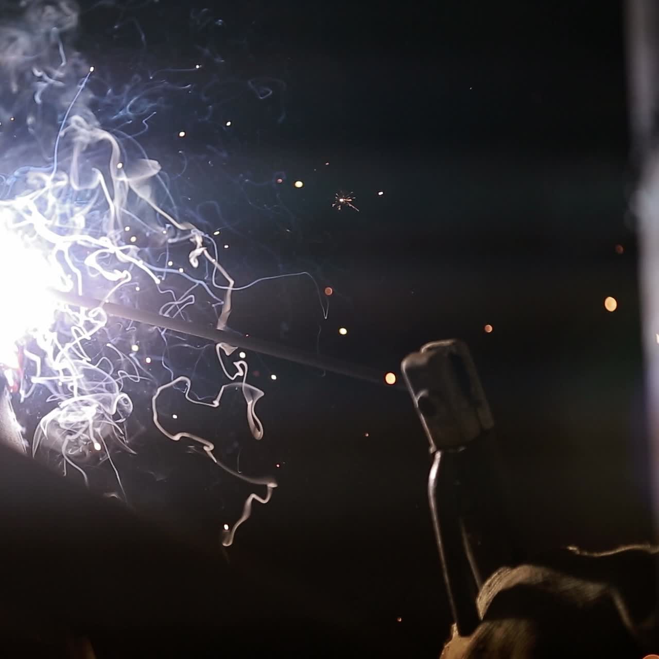 Industrial steel welder in factory