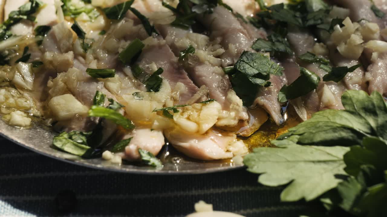 Fresh Sea sardines and Anchovy Fish and Mullus On Display On Ice On Market Store Shop. Seafood Fish Background, close up stand of small salty white fish.