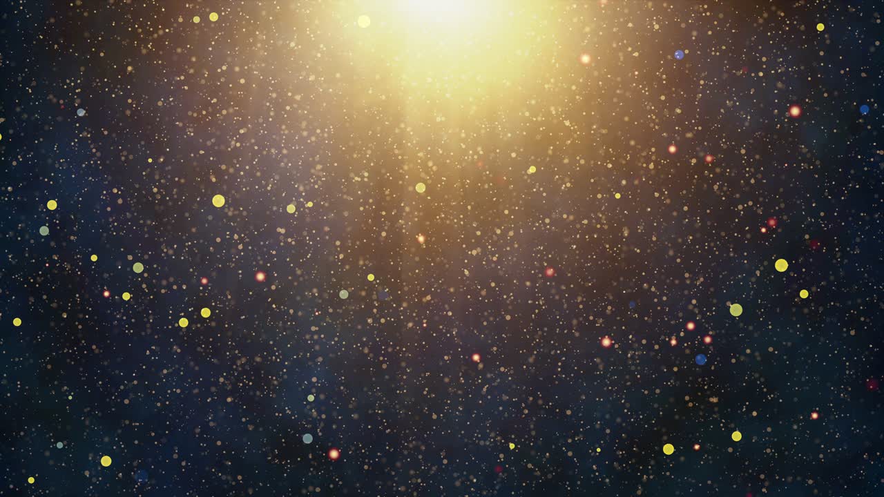 Loopable animation of golden glitter particles swirling anf floating through atmospheric mist in a mesmerizing display of festive elegance