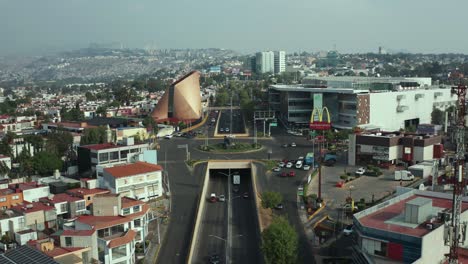 static aerial view of naucalpan, state of mexico, gran terraza shopping mall and gratia plena church
