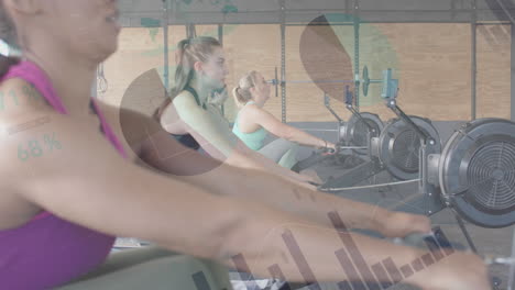 animation of data on interface over diverse women training on rowing machines at gym