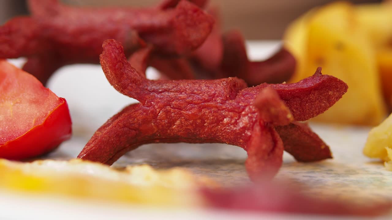 Sausage with tomato and potato