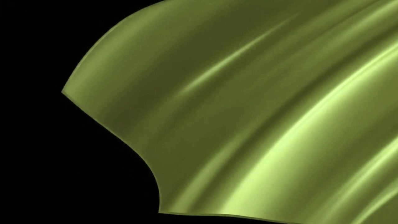 Tela de seda verde desplegándose sobre un fondo negro