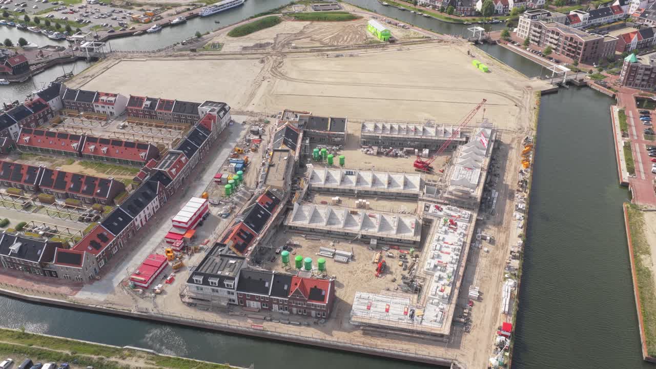 New homes under construction in village streets, building site, Netherlands