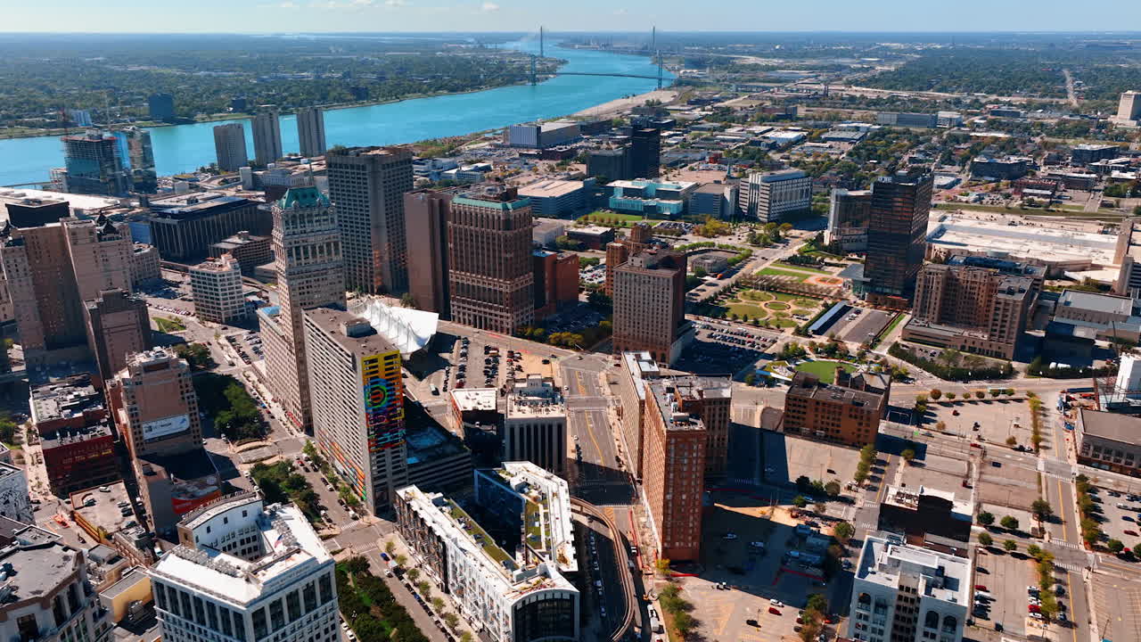 Detroit, USA, 28 July 2025: Downtown Detroit Riverfront and Business District on Sunny Day. An expansive aerial view captures the Detroit downtown core and riverfront on a bright