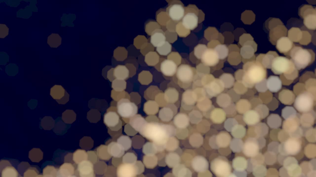 Twinkling Bokeh Diagonal Gold Lights Blue Background Glitter Effect Loop
