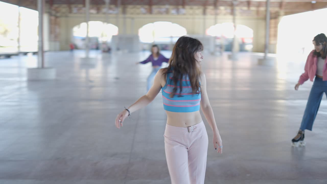 Young Women Roller Skating