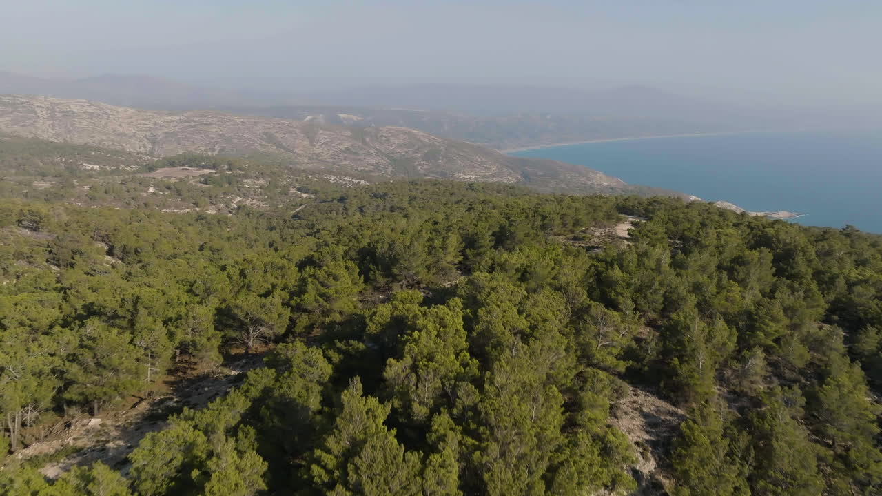 Aerial view over mountains and nature on the west coastline of Rhodes, Greece