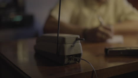 Man at a Desk Nighttime Interview