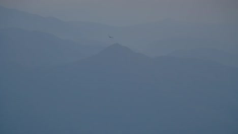 misty mountain view with airplane