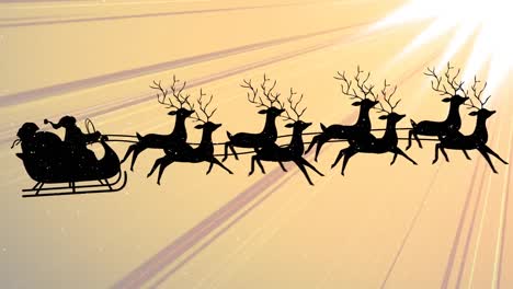 Snow-falling-on-santa-claus-in-sleigh-being-pulled-by-reindeers-against-yellow-light-trails