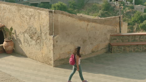 Tracking-shot-of-attractive-Italian-woman-enjoying-the-view-in-Italian-village-during-summer