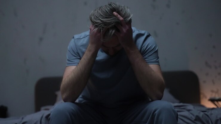 Man in the bedroom at night