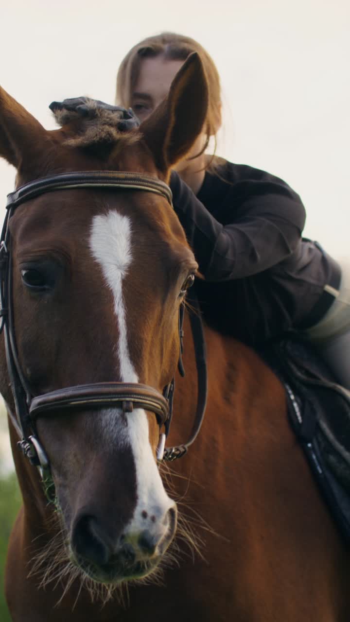 Woman enjoying a ride on a brown horse