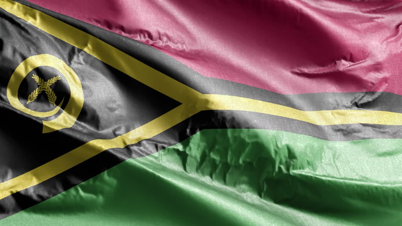 la bandera textil de vanuatu ondeando en el bucle del viento. la bandera de vanuatsky balanceándose en la brisa. el tejido textil de tela. fondo de relleno completo. bucle de 10 segundos.