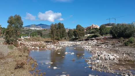 River in Southern Europe, blue skies after the storms and floods