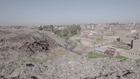 aerial drone shot of dumpsite land fill in dandora, kenya