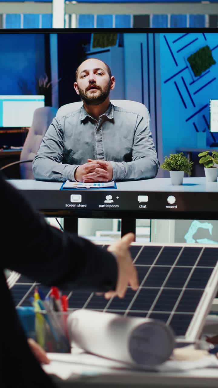 Vertical video Photovoltaics plant researchers doing videocall to optimize energy production