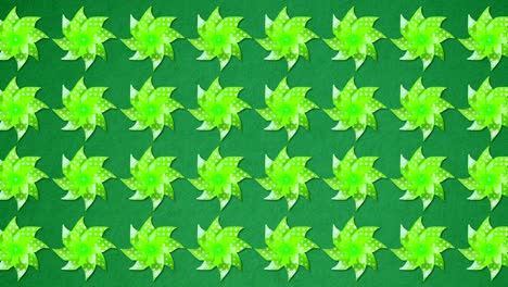serie de muchas ruedas verdes catherine weathercock moviéndose en el viento en el fondo de la pantalla verde, concepto de diversión y educación escuela del niño