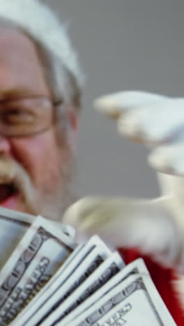 santa claus fanning currency notes