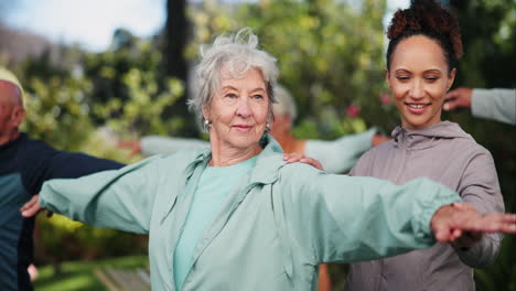 group yoga session with senior woman and instructor outdoors