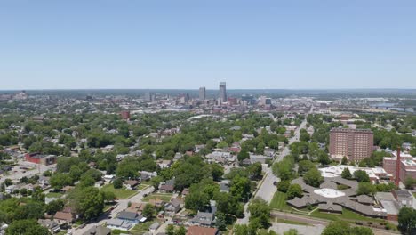 high aerial establishing shot with omaha skyline in background