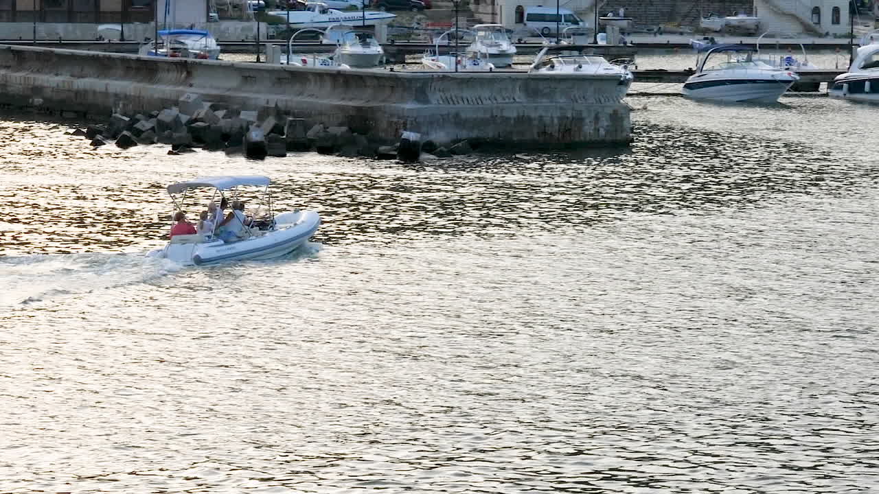 Small boat with passengers in it