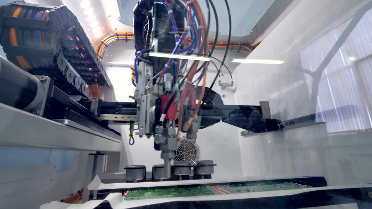 A low view on a circuit board coating machine.