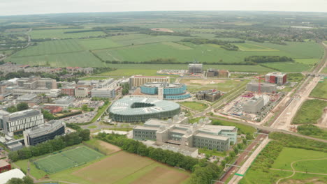 circling aerial shot over the astrazeneca building cambridge