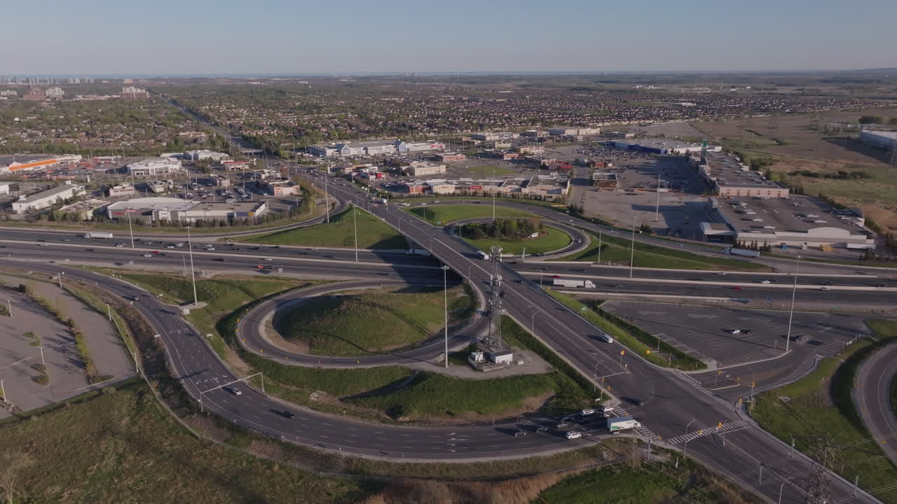Mississauga's highway 401 with busy roads and commercial areas, aerial view