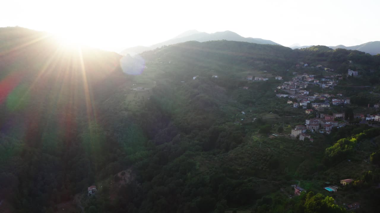 Aerial view of Tuscany rolling hills town at sunset Italy
