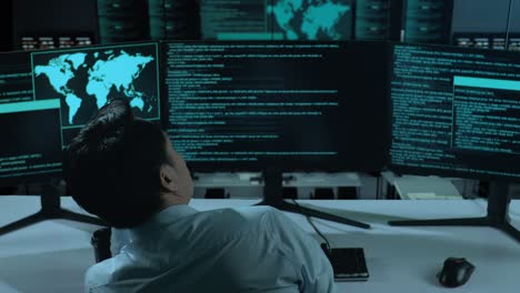 tired programmer in server room