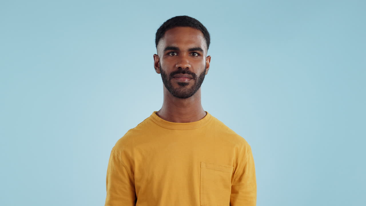 Secret, face and man with finger on lips in studio