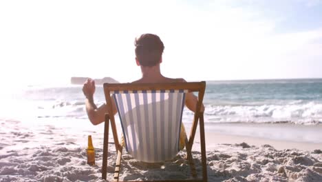 man relaxing on his deckchair