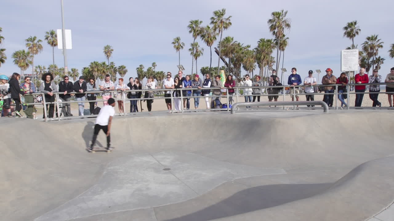 Tracking a skater as he navigates Venice Beach Skatepark. Slow Motion