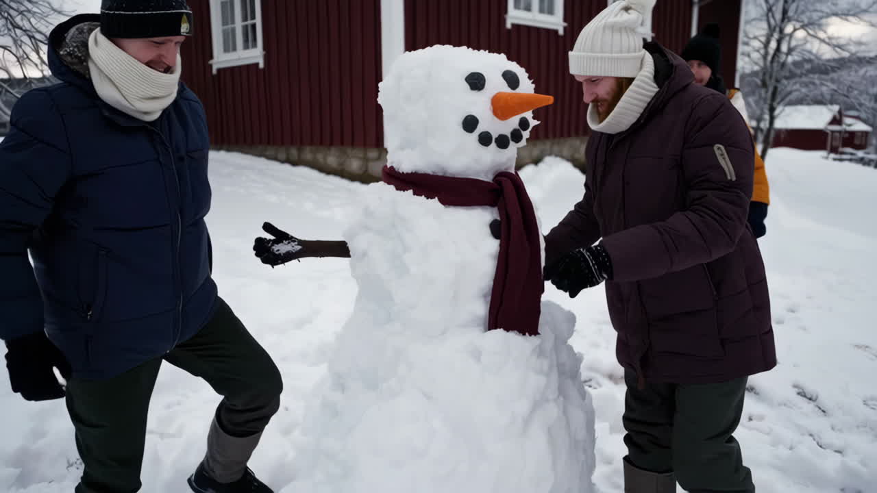 Friends Making a Snowman in the Snow