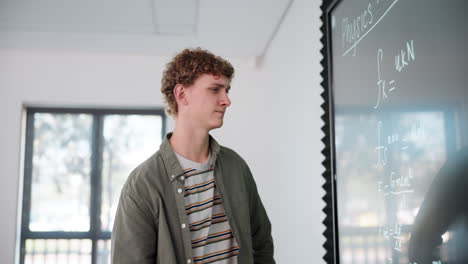 student studying physics in classroom
