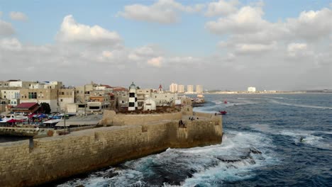 aerial footage over the old city of acre and the mediterranean sea