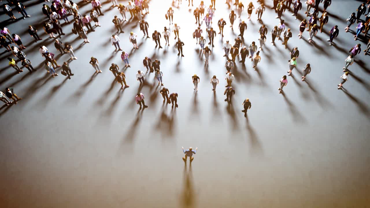 Overhead View of a Leader Addressing a Large Group of People